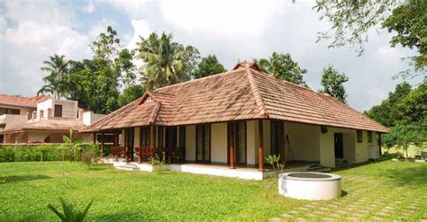 traditional modern mix tharavadu home plans kerala