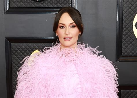 Kacey Musgraves Is Pretty In Pink With Bodysuit And Feathered Cape At