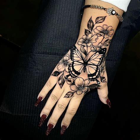 share  butterfly hand tattoo ineteachers