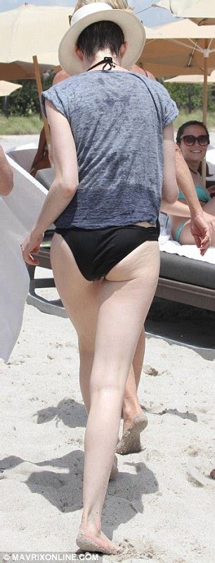 anne hathaway reveals her slender beach body after losing
