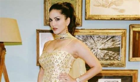 bollywood hottie sunny leone wears shimmery purple outfit and perfect