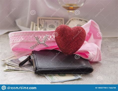 Love For Money Is Prostitution A Crumpled Sheet A Glass