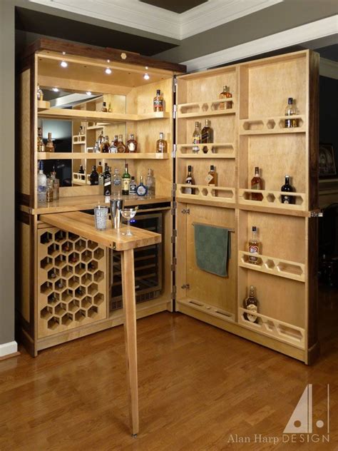hand  custom walnut  birdseye maple liquor cabinet bar  alan