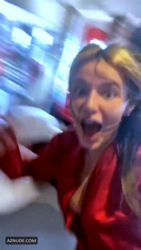 bella thorne slightly flashes her boob while dancing to