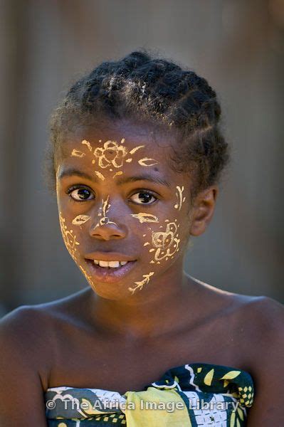 Girl With Traditionally Painted Face From The Sakalava Tribe Nosy Be