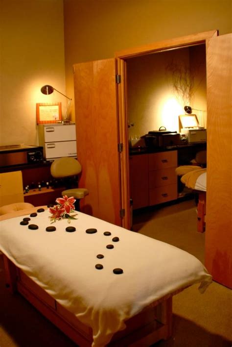 love the presentation of rocks and flowers massage room