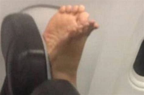 plane passenger shames fellow flyer who put their bare feet on the back of her seat