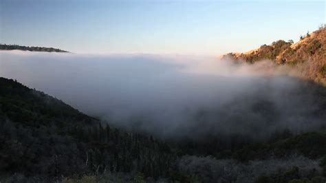 time lapse  fog rolling    hills   big sur  californiafog rolling inmov stock