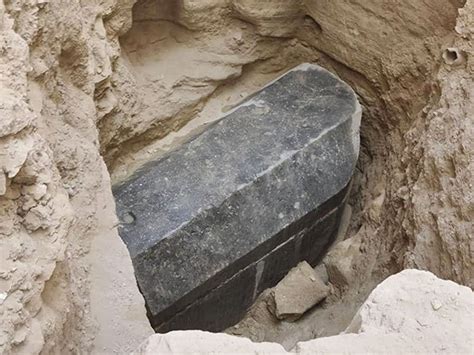 archaeologists found a massive black coffin in egypt—prepare to open