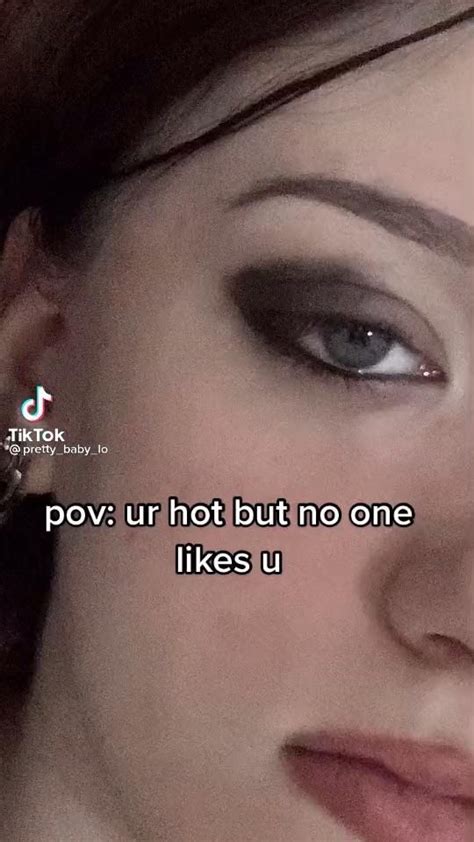 A Close Up Of A Person With An Earring On Their Head And The Words Pov