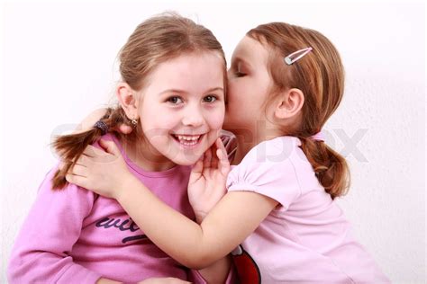 Girl Whispering A Secret To Her Girlfriend Stock Image Colourbox