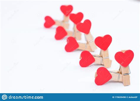 Group Sex Concept Close Up Photo Of Clothespins With Red Hearts On
