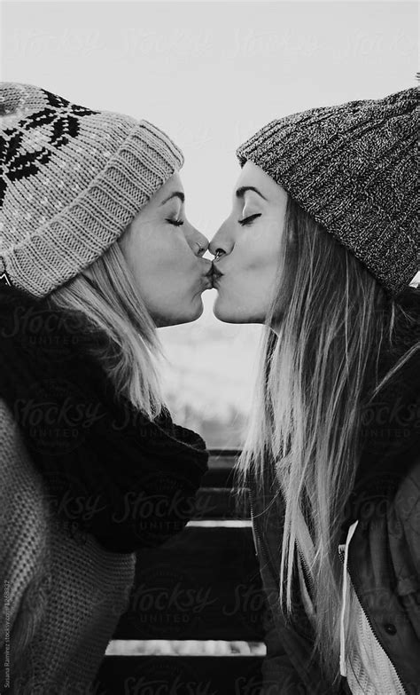 two women kissing by stocksy contributor susana ramírez stocksy