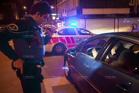 policeman control identity french men night time