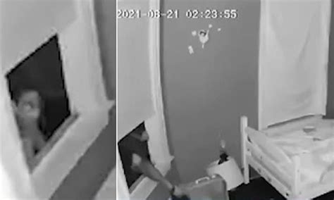 burglar creeps in through bedroom window just steps away from two