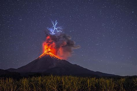 incredible image captures moment lightning struck  erupting volcano