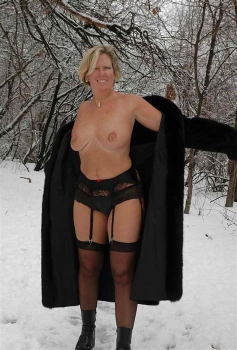 sexy mature wife in the snow in fur coat and lingerie 32 pics