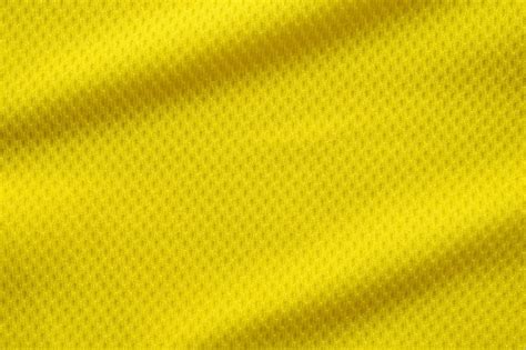 premium photo yellow color football jersey texture