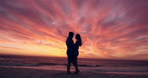 happy couple kissing on beach stock footage video 100