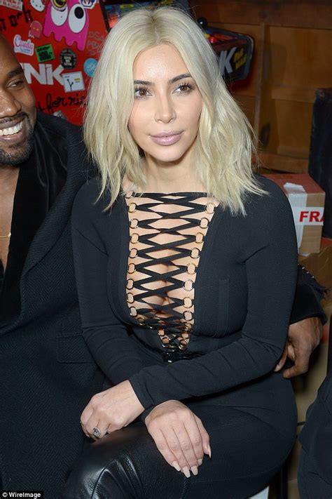Braless Kim Kardashian Displays Her Cleavage In Deeply