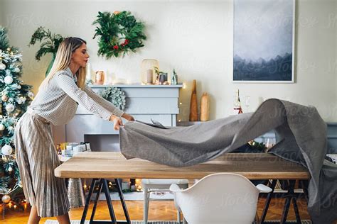 Woman Putting Table Cloth By Stocksy Contributor Lumina Stocksy
