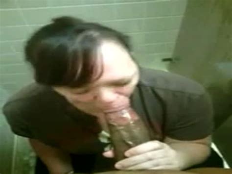 employee sucking and swallow a bbc in the bathroom at