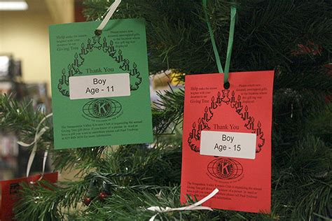 giving tree program launches   holidays   red green