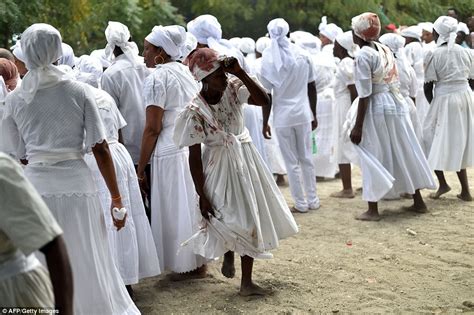 Haitian Voodoo Followers Sacrifice Goats During Annual