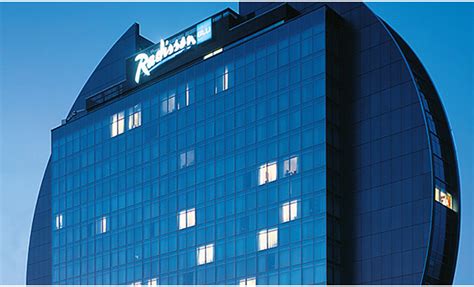 jin jiang international holdings   buy radisson hospitality