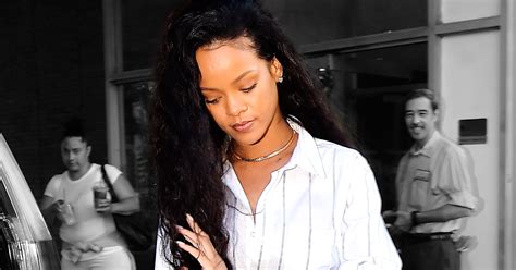 Rihanna Miniskirt Over Button Up Shirt Outfit Photo