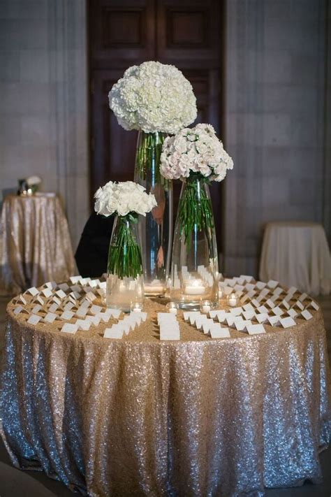 Guide Guests To The Place Card Table With An Asymmetrical Floral