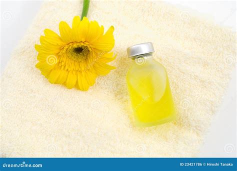 essential oil   yellow towel stock photo image  gerbera