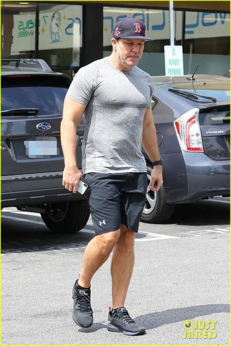 dane cook flaunts his biceps in fitted t shirt while