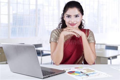 attractive indian businesswoman smiling  office stock image image