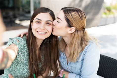 lesbian sisters kissing telegraph