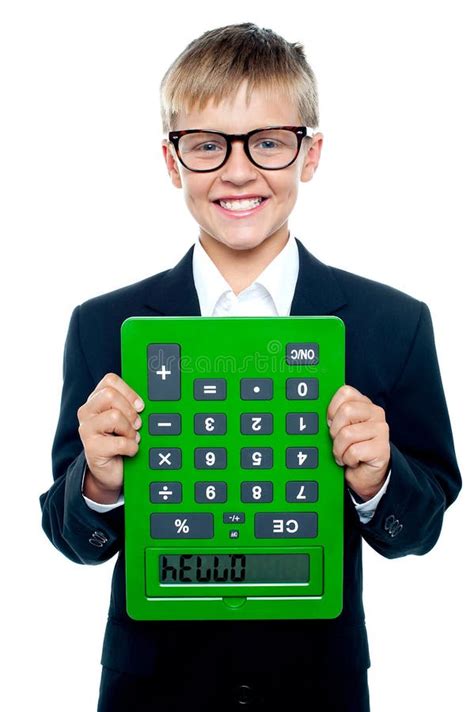 school boy holding calculator upside  stock photo image  calculator background