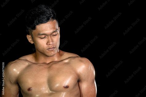 Asian Muscle Men Posing Muscle Front On The Black Background Body Gym