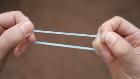 stretched rubber band stock footage video shutterstock