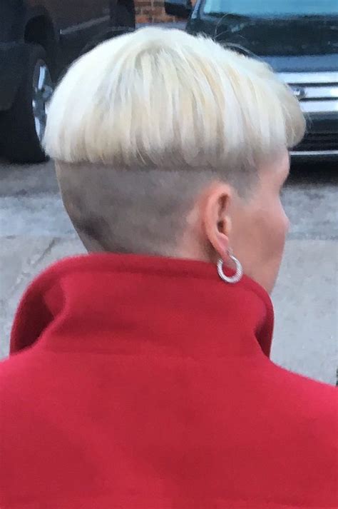 blonde two tone shaved nape bowlcut with turtleneck and