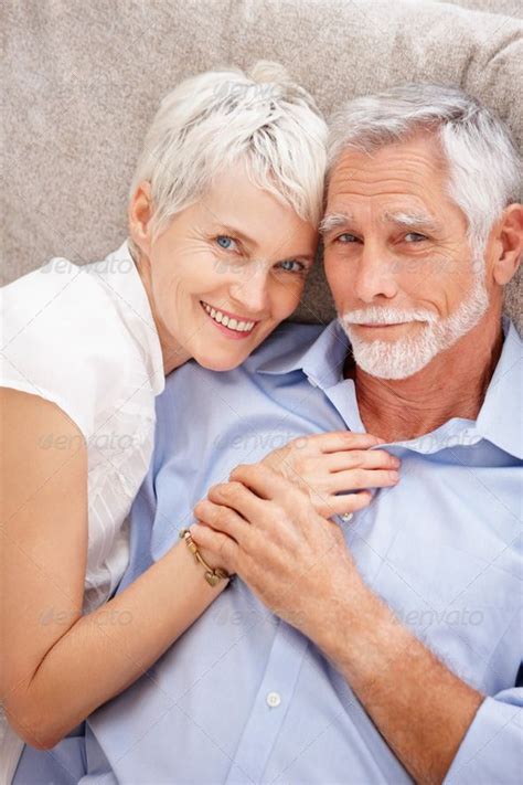 Portrait Of A Sweet Elderly Couple Posing When Photographing Elderly