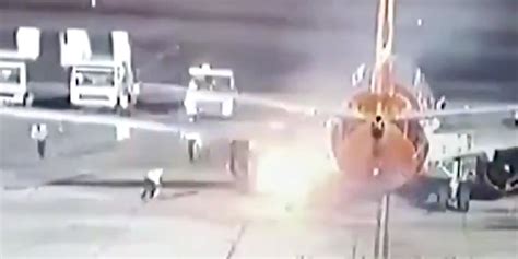 video shows  boeing  carrying  people burst  flames   landing   egyptian