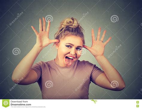 Woman With Funny Face Mocking Someone Making Fun Of