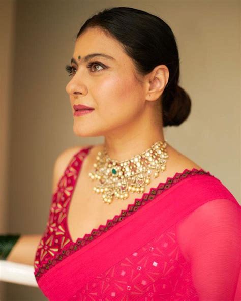 bollywood actress kajol devgan in red saree and sleeveless blouse hot