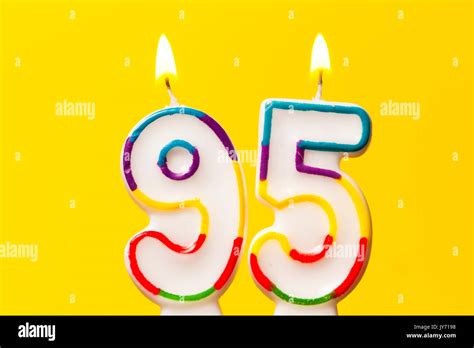 number  birthday celebration candle   bright yellow stock