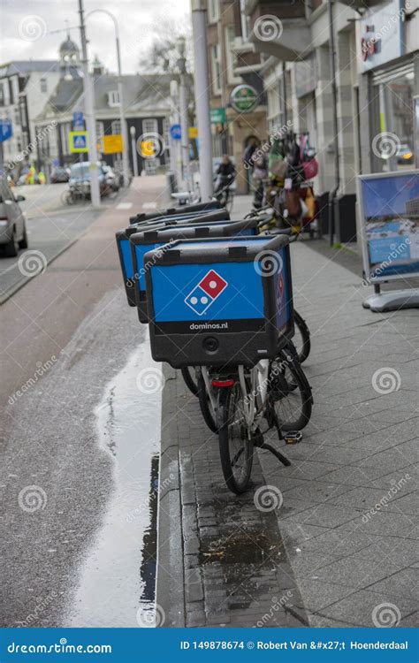 dominos pizza delivery bicycles  amsterdam  netherlands  editorial stock image image