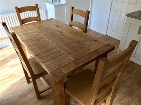 seater wooden rustic dining table including  oak chairs