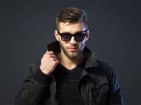portrait  cool  handsome young man  casual wear stock photo image  sunglasses