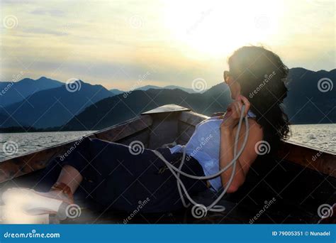 woman lying    boat     distance stock image image  female adult