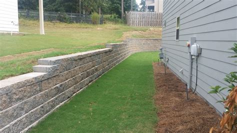 retaining wall surrounding  construction landscaping lawn care