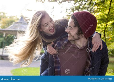 Couple Enjoying A Playful Walk Stock Image Image Of Couple Dating